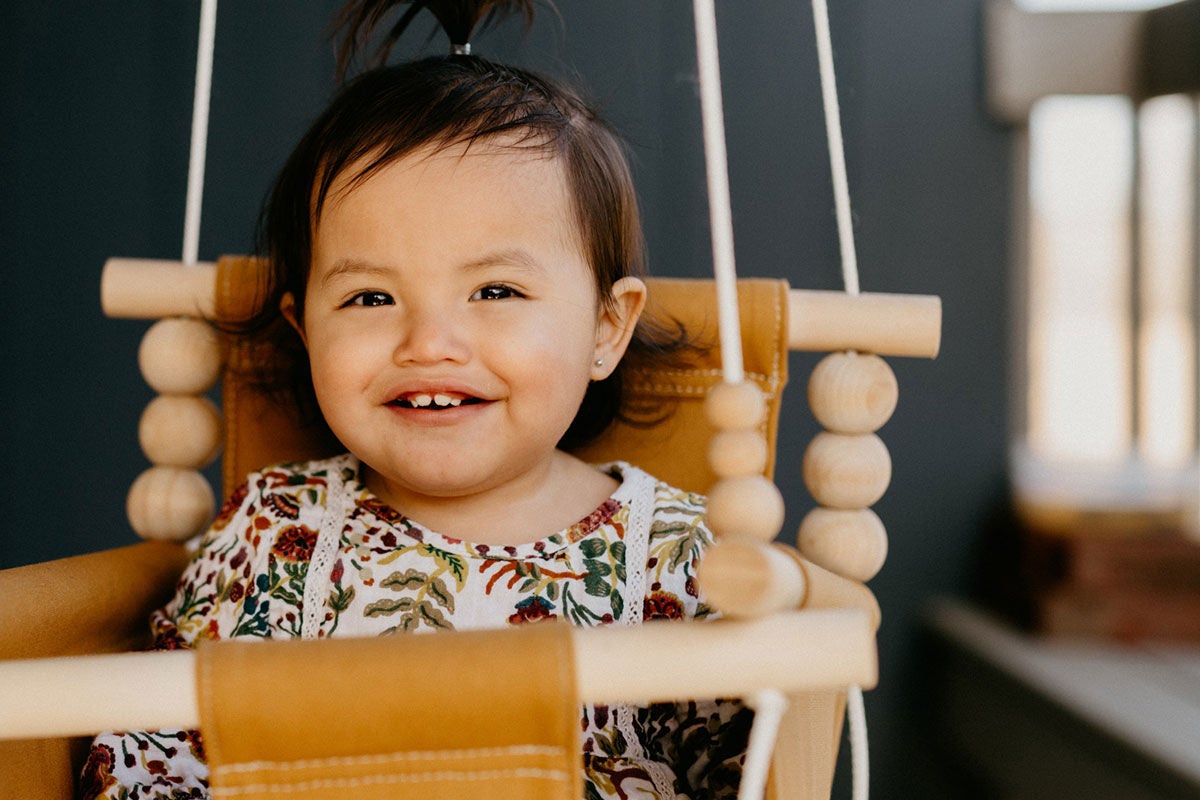Toddler smiling after dental visit (medicaid plan type)