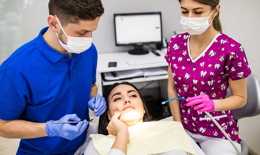 unhappy dental patient at dentist