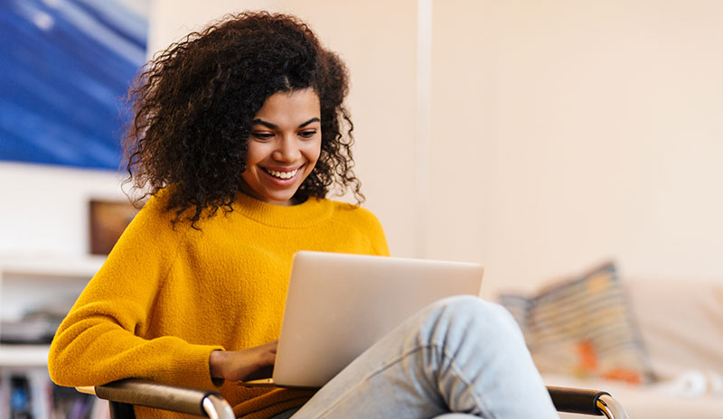 Dental patient reading a dental newsletter