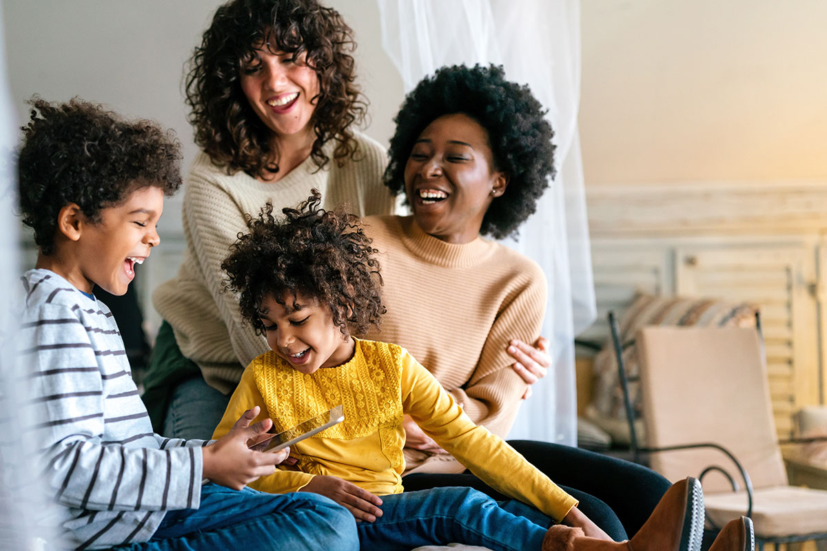 Mother with children waiting to see dentist (CHIP plan type)