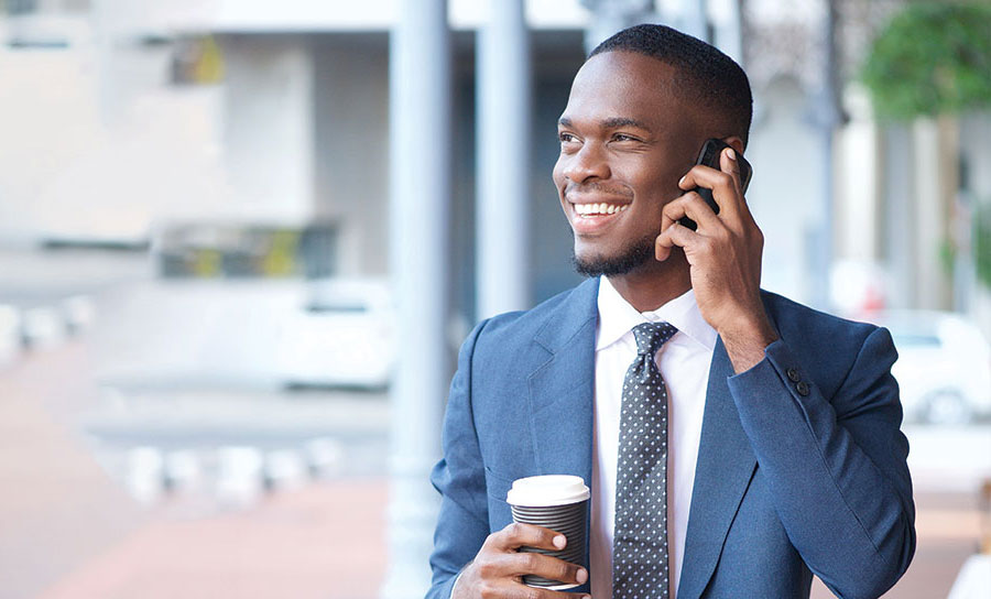 business man on phone outside