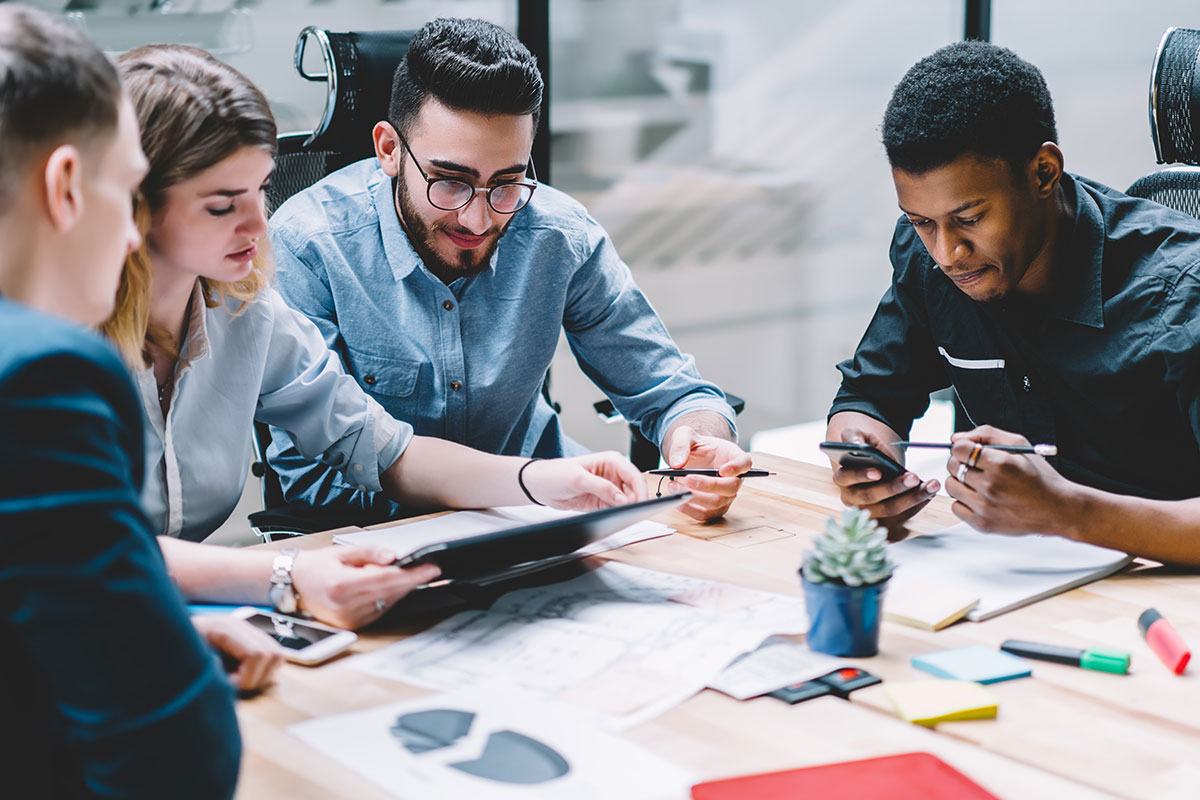 employees at a table working