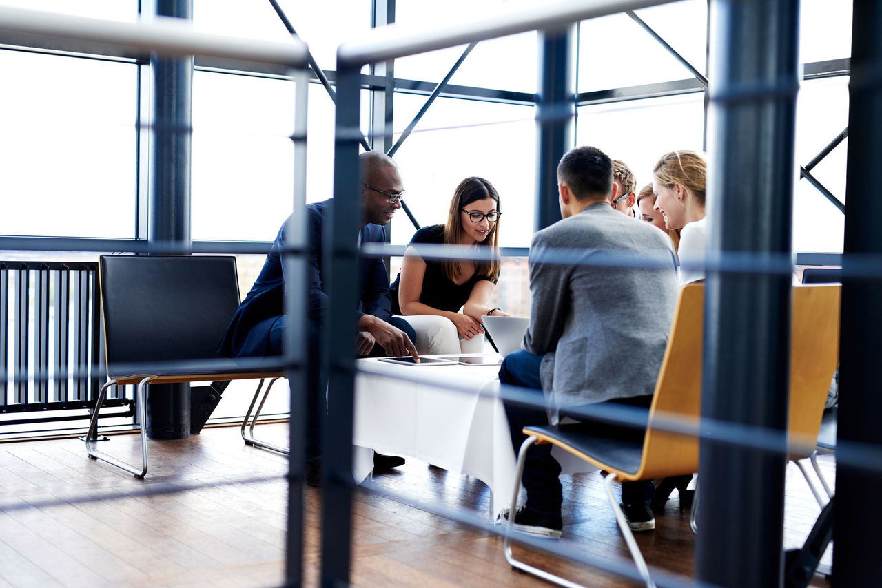 Brokers collaborating in an office