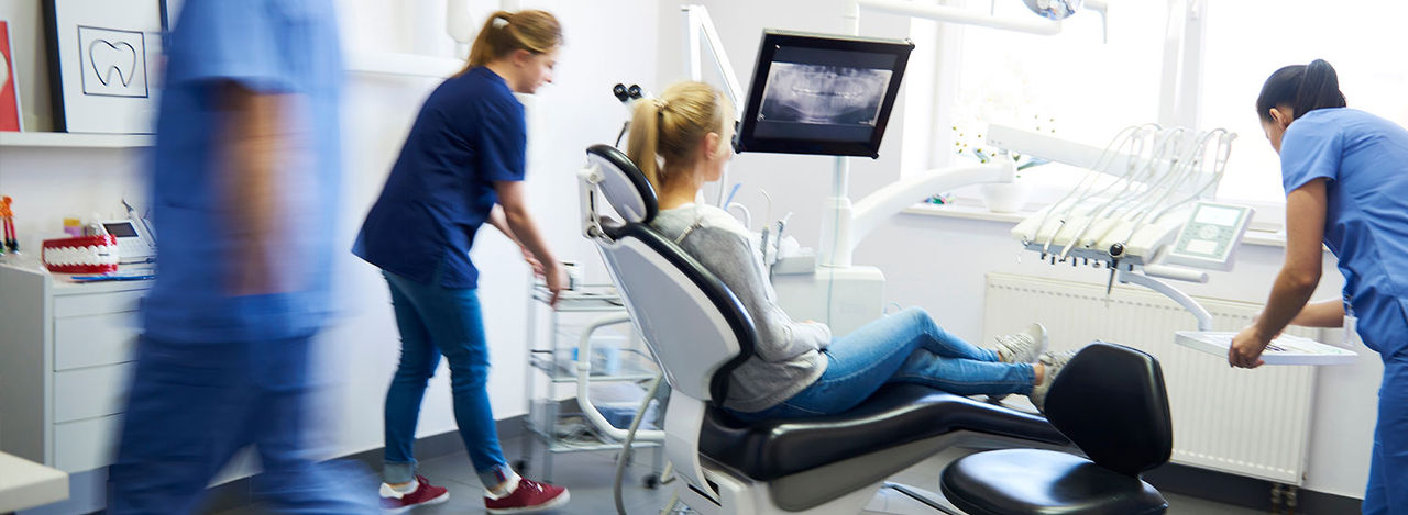 Dentist with patient