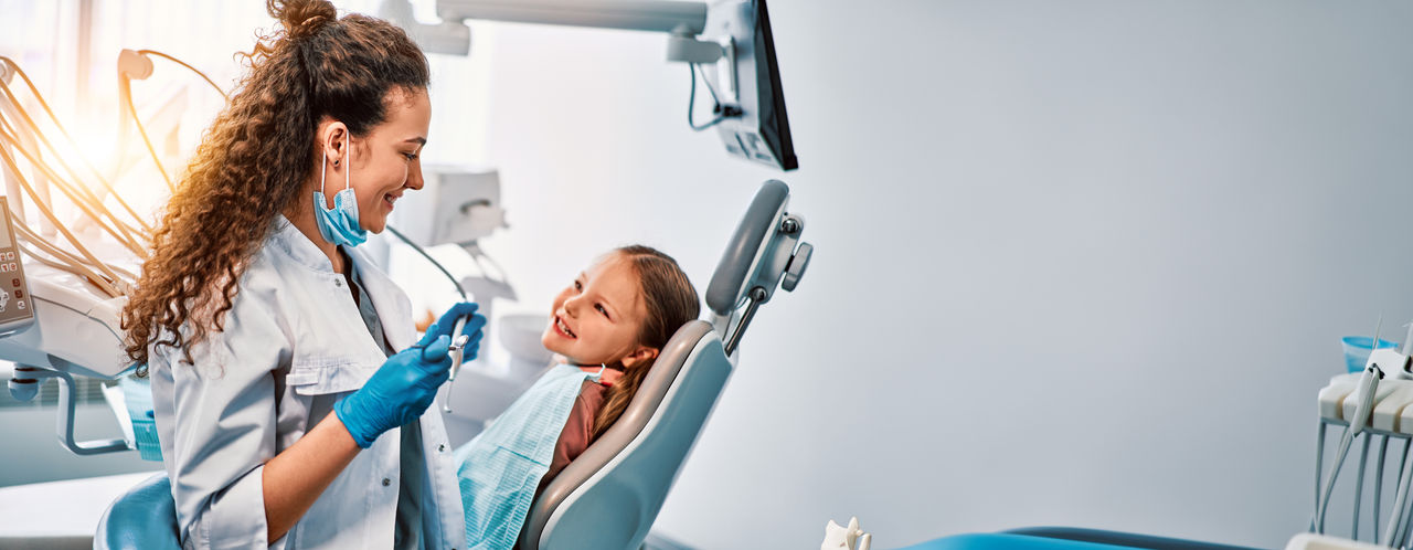 dental patient with dentist in dental chair